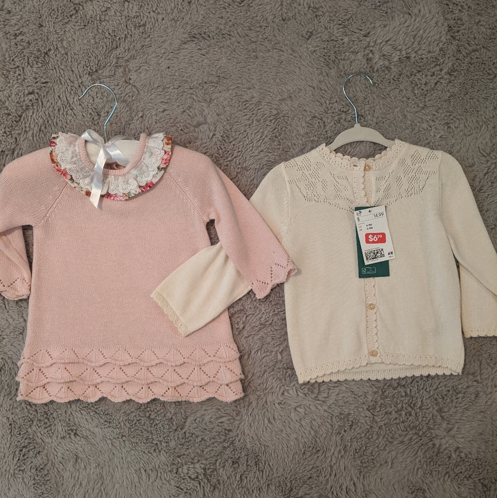 Two new baby sweaters never worn